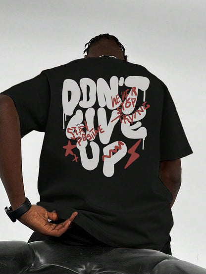 Don't Give Up Black Off Shoulder Graphic Tee