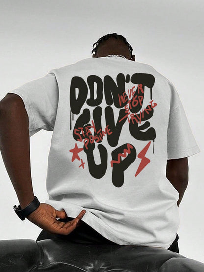 Don't Give Up White Off Shoulder Graphic Imported Tee